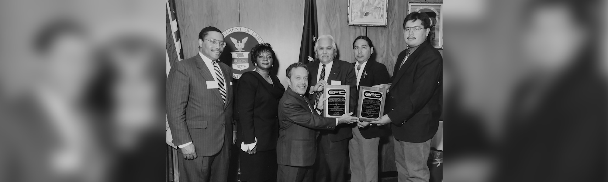 Receiving award from Robert Reich in Washington, DC